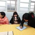 認輔老師陸續到達會議會場簽到。